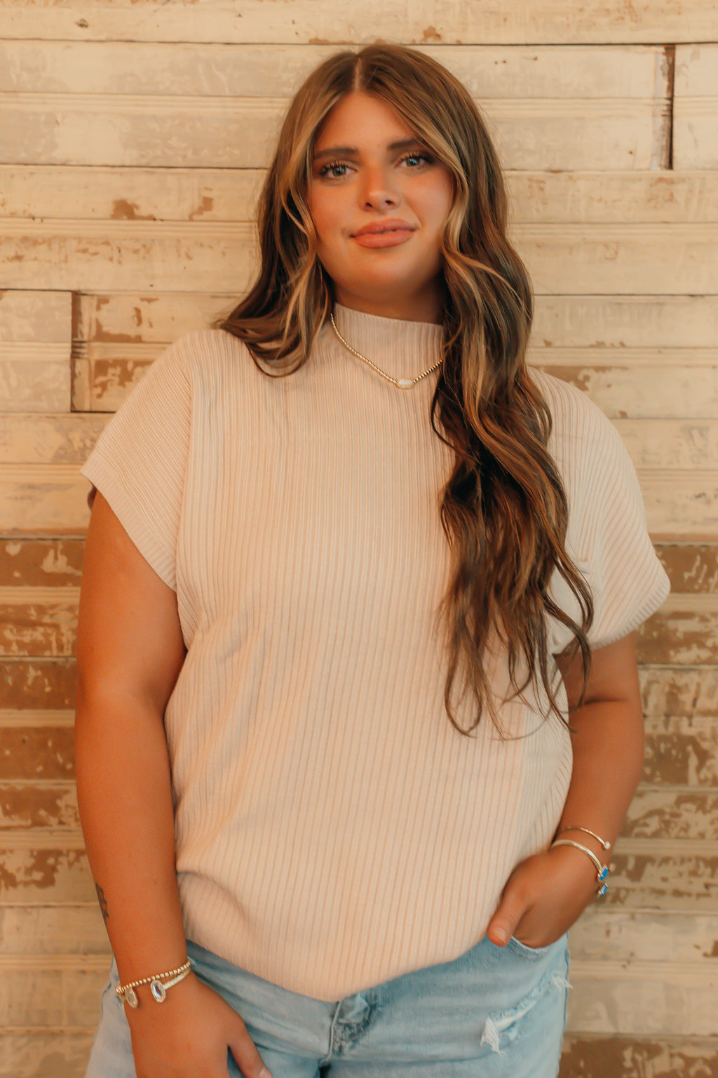 cozy in cream turtleneck.